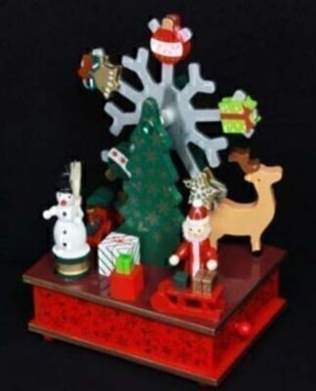 Wooden Toys Music Box Christmas Decoration by Gisela Graham. This Music box is sure to be a delight for children and Christmas time.  Music - Silent Night. Size 20x14x10cm  This Christmas decoration will be a firm favorite for generations to come.<br><br>
If it is Christmas Decorations to be sent anywhere in the UK you are after than look no further than Booker Flowers and Gifts Liverpool UK. Our Christmas Decorations are specially selected from across a range of suppliers. This way we can bring you the very best of what is available in Christmas Decorations.<br><br>
Gisela loves Christmas Gisela Graham Limited is one of Europes leading giftware design companies. Gisela made her name designing exquisite Christmas and Easter decorations. However she has now turned her creative design skills to designing pretty things for your kitchen, home and garden. She has a massive range of over 4500 products of which Gisela is personally involved in the design and selection of. In their own words Gisela Graham Limited are about marking special occasions and celebrations. Such as Christmas, Easter, Halloween, birthday, Mothers Day, Fathers Day, Valentines Day, Weddings Christenings, Parties, New Babies. All those occasions which make life special are beautifully celebrated by Gisela Graham Limited.<br><br>
Christmas and it is her love of this occasion which made her company Gisela Graham Limited come to fruition. Every year she introduces completely new Christmas Collections with Unique Christmas decorations. Gisela Grahams Christmas ranges appeal to all ages and pockets.<br><br>
Gisela Graham Christmas Decorations are second not none a really large collection of very beautiful items she is especially famous for her Fairies and Nativity. If it is really beautiful and charming Christmas Decorations you are looking for think no further than Gisela Graham.<br><br>
This wooden toys music box by Gisela Graham is a really beautiful Christmas Decoration that will be enjoyed year after year. It is sure to delight and will fit in well with many Christmas themes and decorations especially a Traditional Christmas theme. Coming out year after year it will bring a smile to your face and bringing Christmas cheer and festive spirit to the house. For Gisela Graham Christmas Decorations sent anywhere in the UK remember Booker Flowers and Gifts in Liverpool UK
